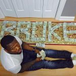 50 Cent naar de rechter om foto’s met geld