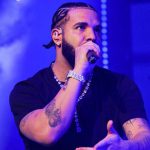Drake stopt show nadat fan van balkon viel