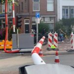 Auto rijdt door slagbomen ‘knip’ Amsterdam